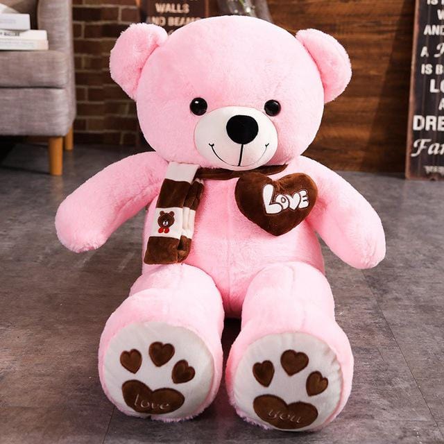 Ourson rose en peluche adorable au grand sourire
